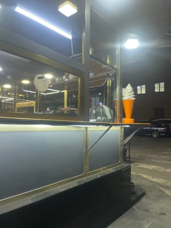 Nighttime commercial district scenes captured in central Yerevan