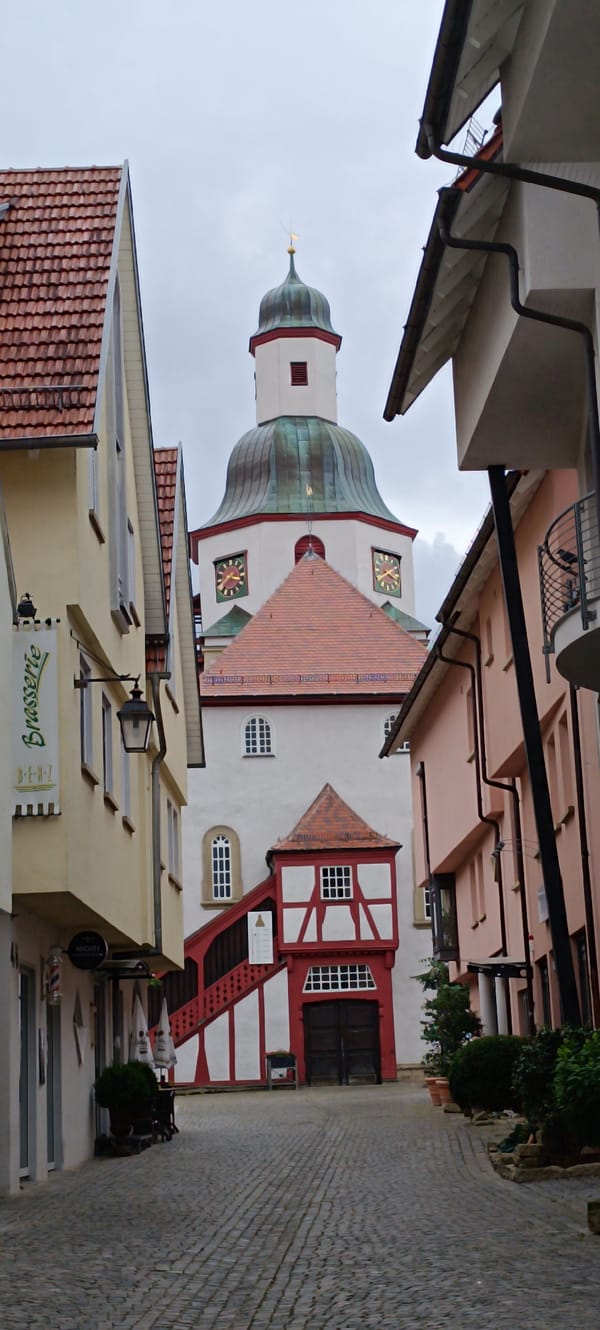 Stormy afternoon drifting through Winnenden's old town streets and rooftops
