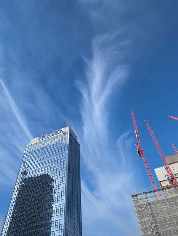 Modern glass skyscraper photographed from below in Berlin
