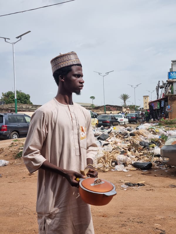 Daily life unfolds across Jos, Nigeria streets and markets