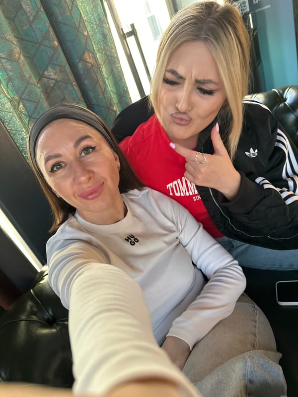 Two women dine and take selfies at Votkinsk restaurant