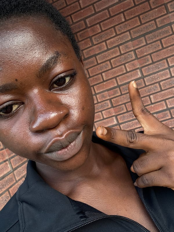 Nail filing session documented up close in Ajara, Nigeria