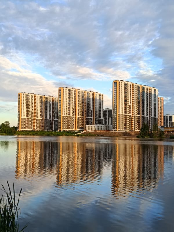 New Okhta lakeside complex and local Orthodox churches, Saint Petersburg