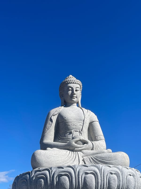 Buddha statue photographed overlooking Krasnoyarsk, Russia