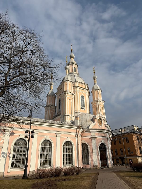 Tourist documents Smolny Cathedral visit in early spring Saint Petersburg