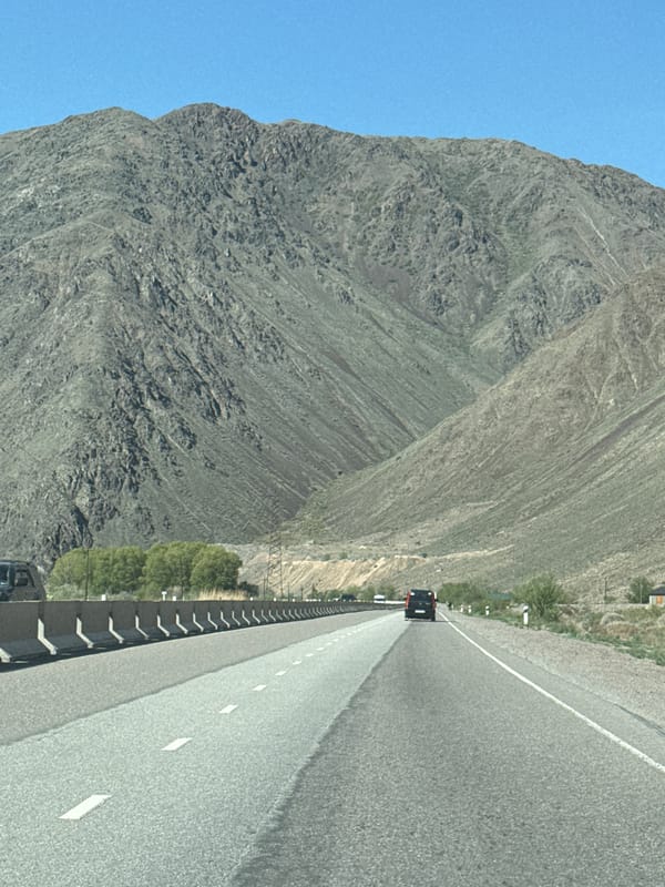 Vehicle captures highway view in Kyrgyzstan
