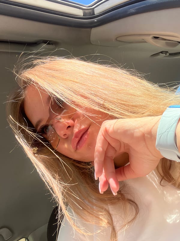 Woman photographed in casual poses around Budva, Montenegro