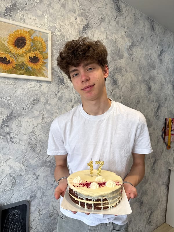Person holds cake in room in Шебунино, Russia