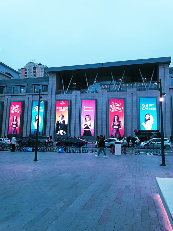 Ordinary street life documented across central Baku plazas
