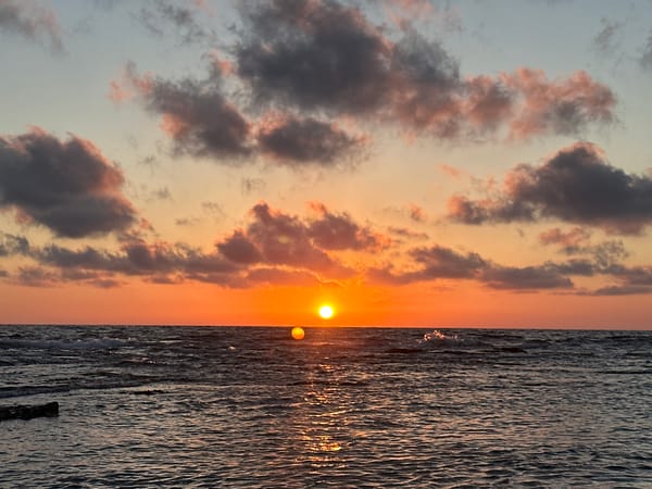 Sunset hour on Haifa's rocky Mediterranean shore