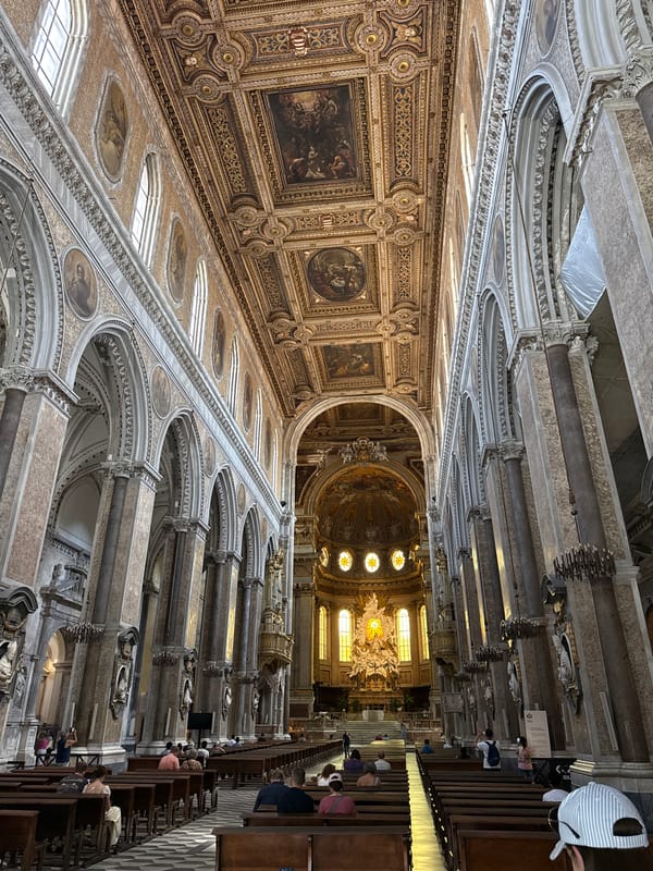 Morning tour through Naples churches, cloisters, and street scenes