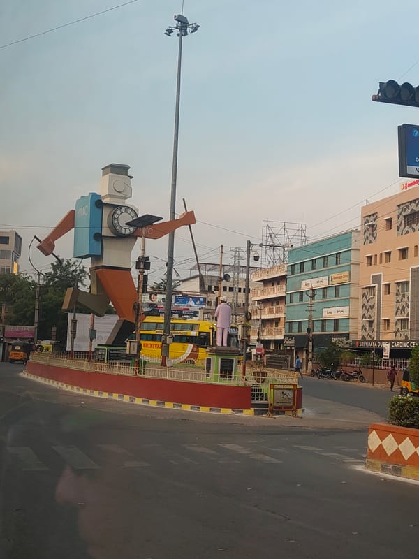 Geometric cartoon statue observed at Kurnool traffic roundabout