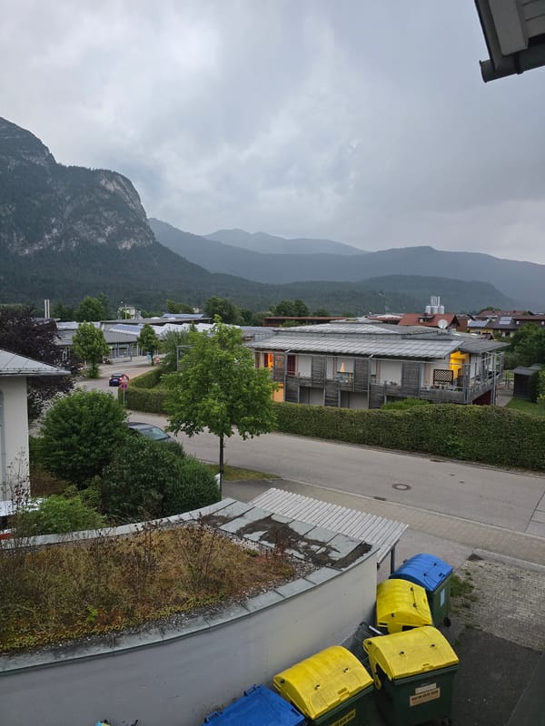 Garmisch-Partenkirchen neighborhood under cloudy Alpine skies
