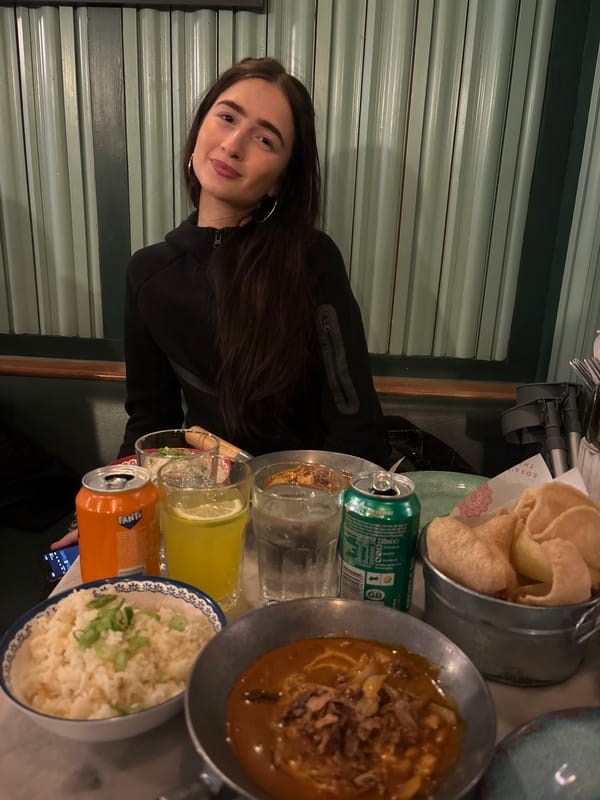Couple shares curry dinner at London restaurant