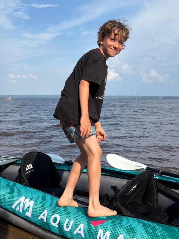 Family enjoys afternoon kayaking outing near Noviy, Russia