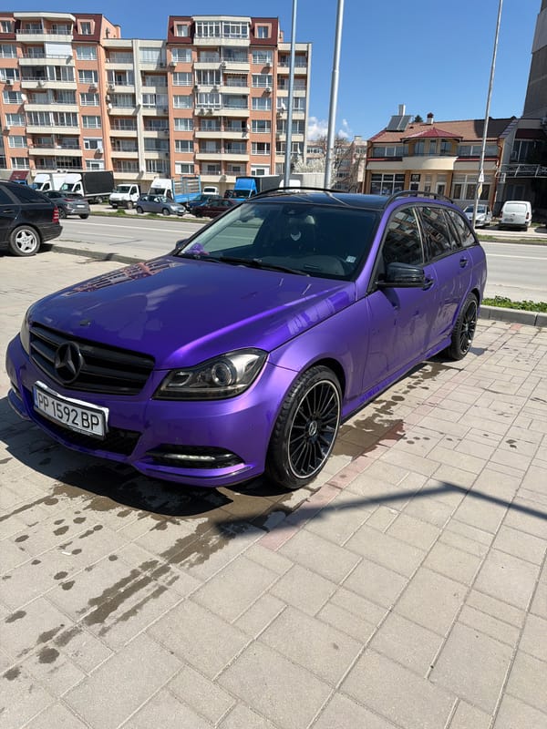 Purple Mercedes spotted parked on sidewalk in Razgrad, Bulgaria