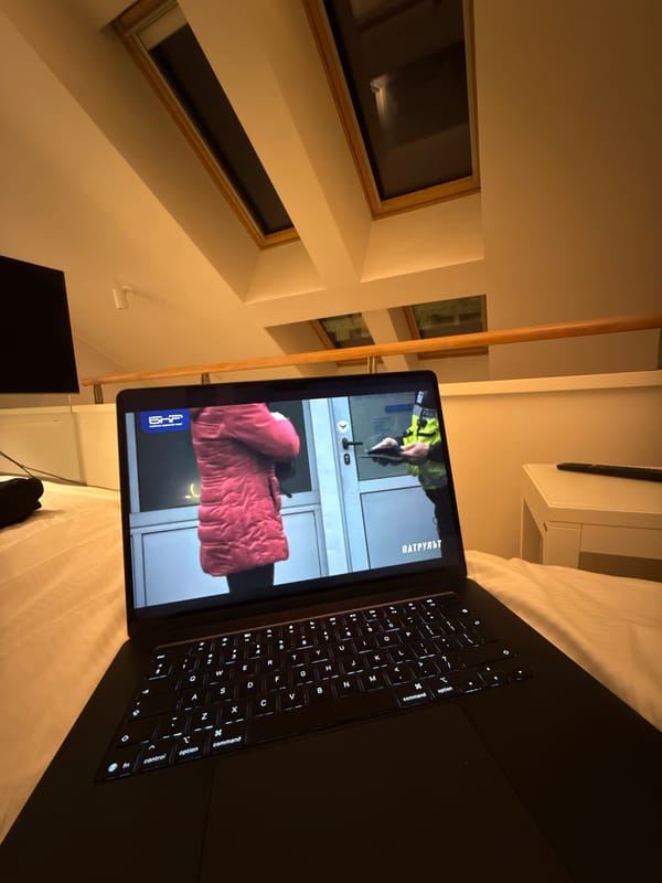 Laptop user in Budapest views Russian news, code
