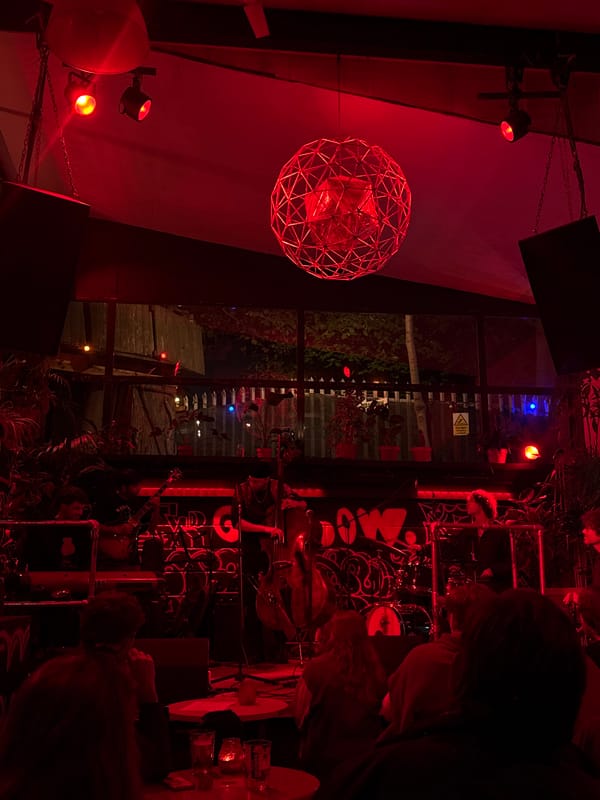 London venue interior captured with distinctive red geodesic lighting