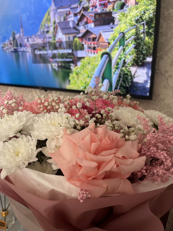 Flower bouquet documented in quiet domestic moments, Kaspiysk