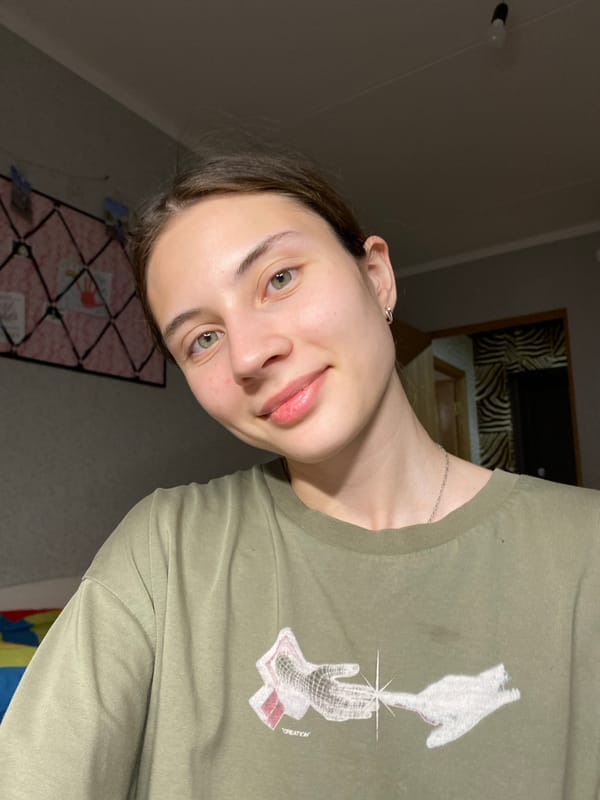 Woman photographs herself with cats at Votkinsk home