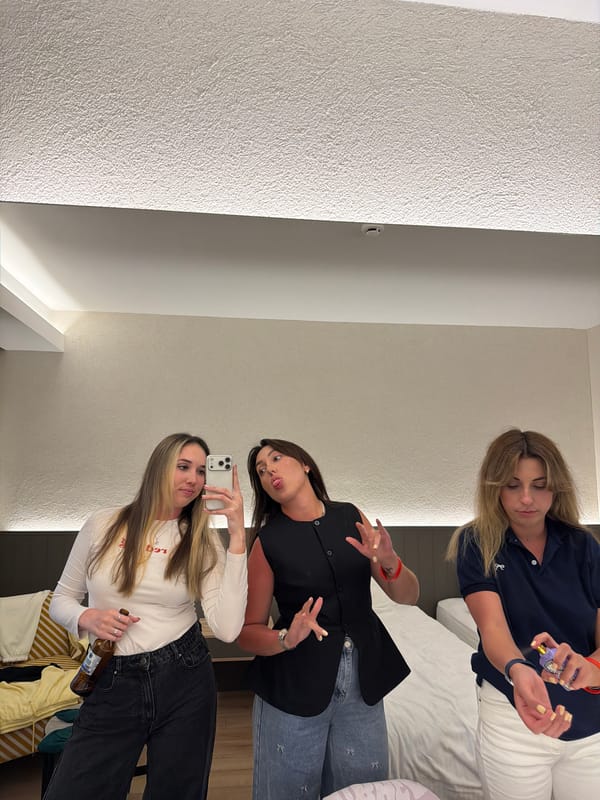 Young women take selfies in hotel room in Serik