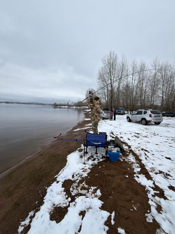 Angler uses bloodworm bait while fishing in Chaikovsky, Russia