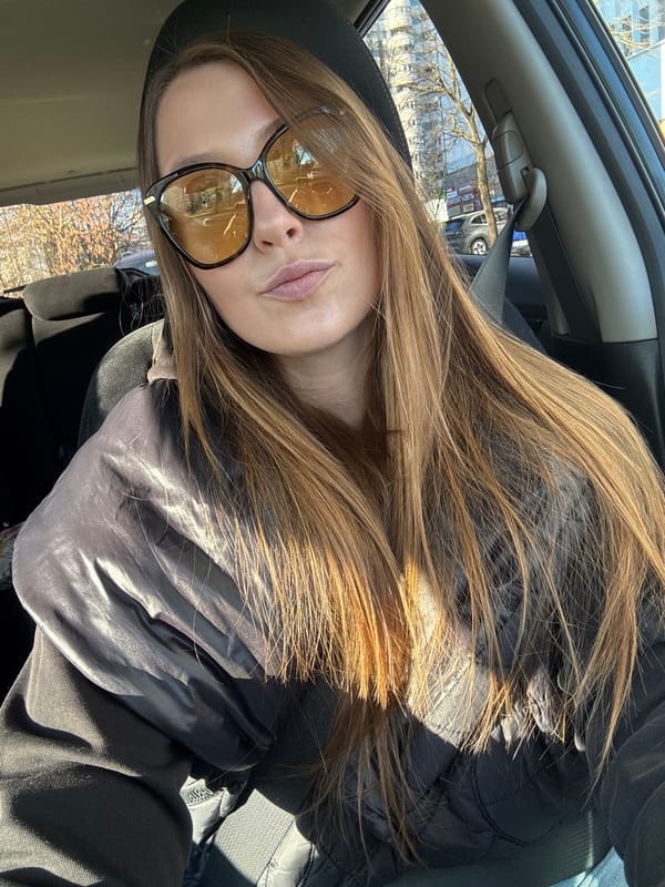 Woman photographed in car driver's seat in Minsk