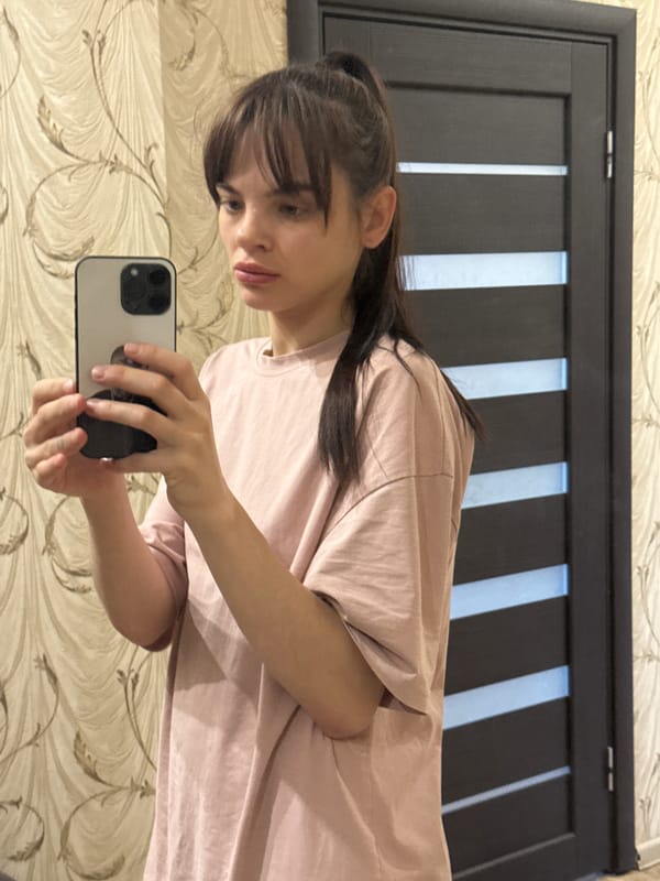 Woman takes mirror selfies in Rostov-on-Don apartment