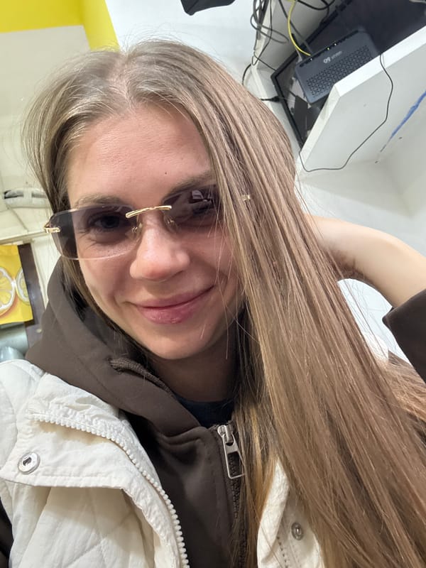 Woman documents indoor visit with selfies in Batumi, Georgia