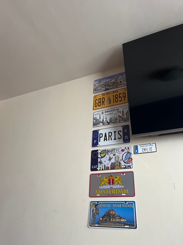 European decorative license plates displayed in Puebla home