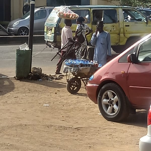 Nigerian street life documented in afternoon scenes