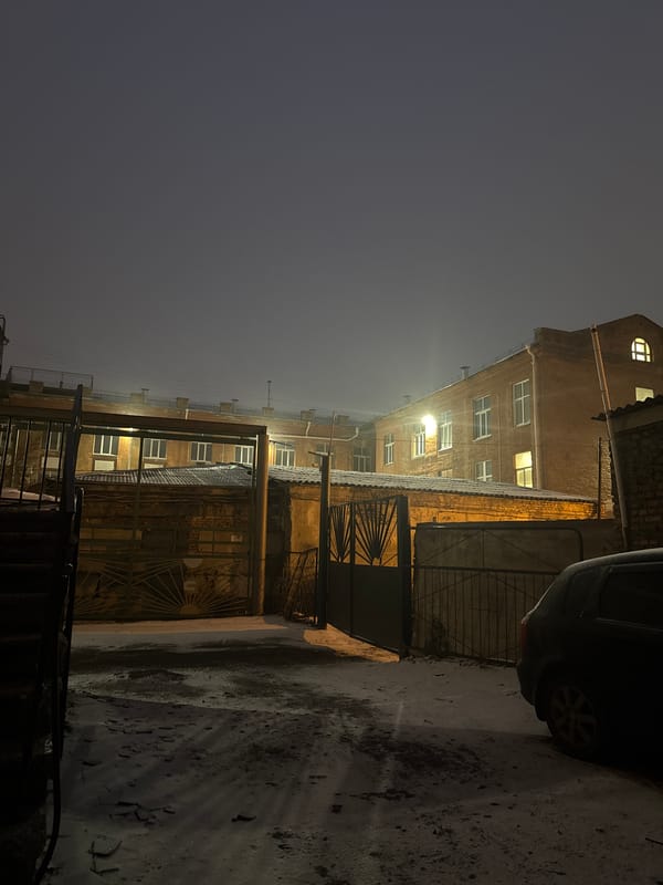 Foggy night courtyard scene documented in Krasnoyarsk, Russia