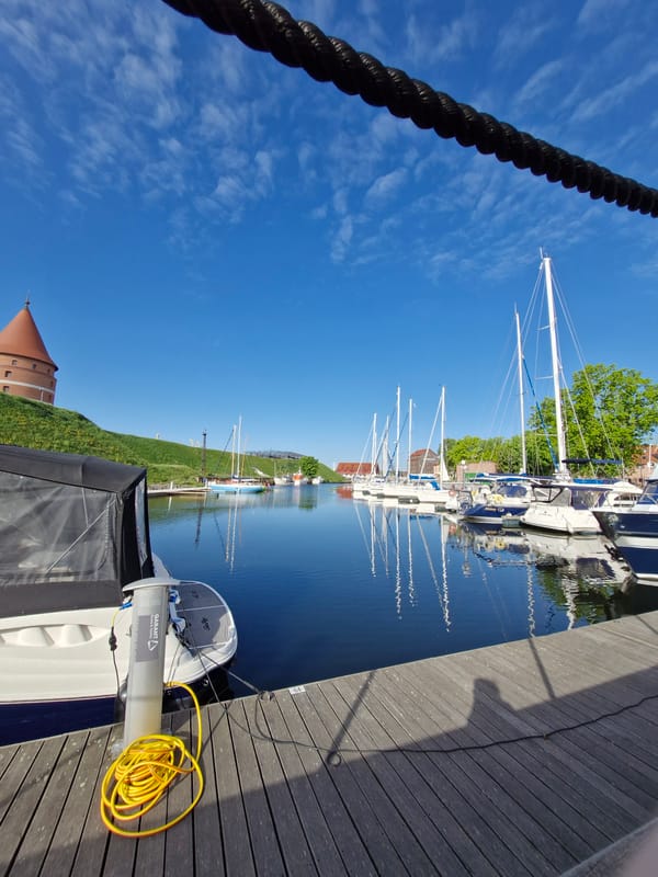 Sunny morning scenes captured at Klaipėda marina and waterfront