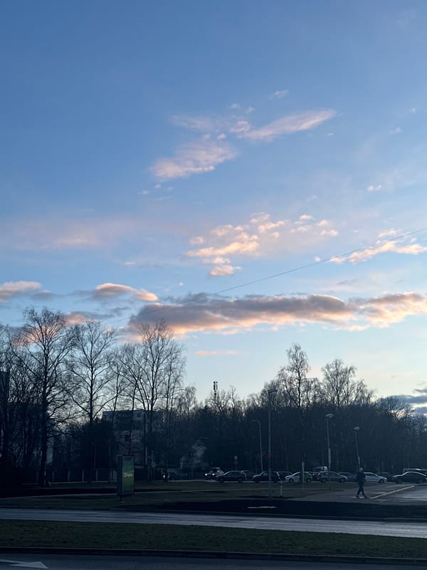 Late afternoon street scenes captured during sunset in Riga