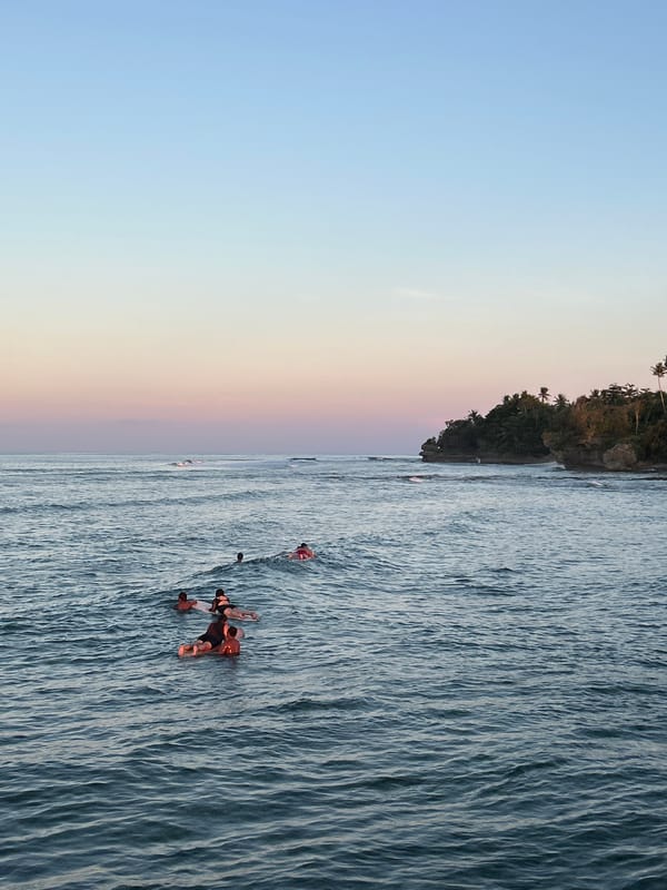 Sunset surfing session draws crowds to General Luna beaches