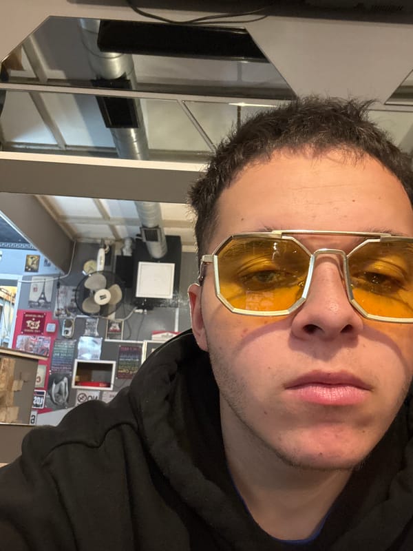 Man takes selfies indoors in Kostinbrod, Bulgaria