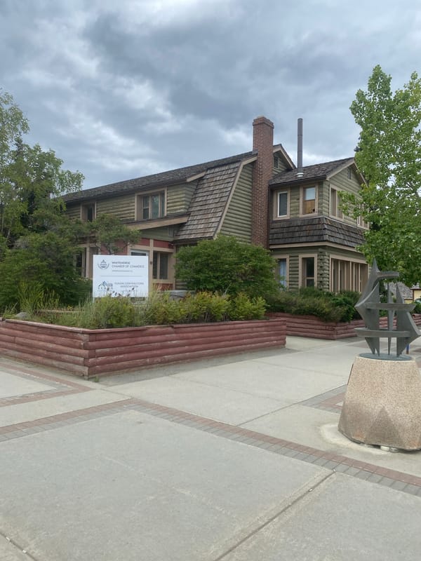 Outside the Whitehorse Chamber of Commerce on a summer evening