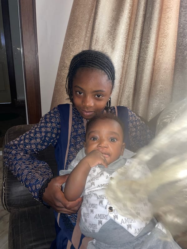 Mother and infant captured in quiet moment in Jos
