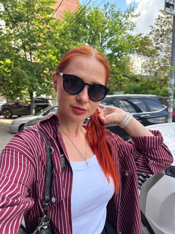 Woman in striped shirt observed on Rostov-on-Don street