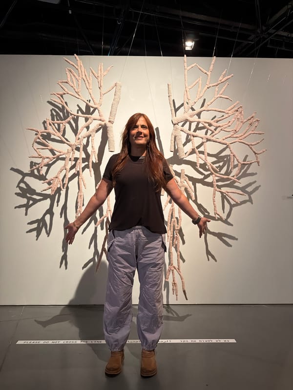 Gallery visitors explore art installations in Tel-Aviv museum