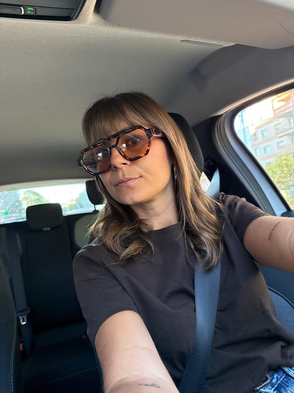 Woman takes selfie in car in Le Cannet, France