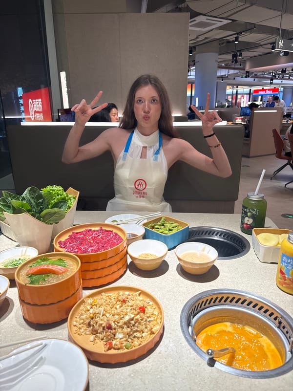 Woman documents seafood dining experience at Shanghai restaurant
