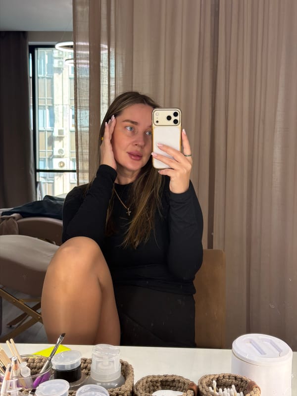 Woman takes selfies in Moscow beauty setting and elevator