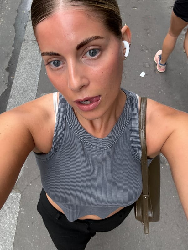Selfie moment on a Paris street, summer evening