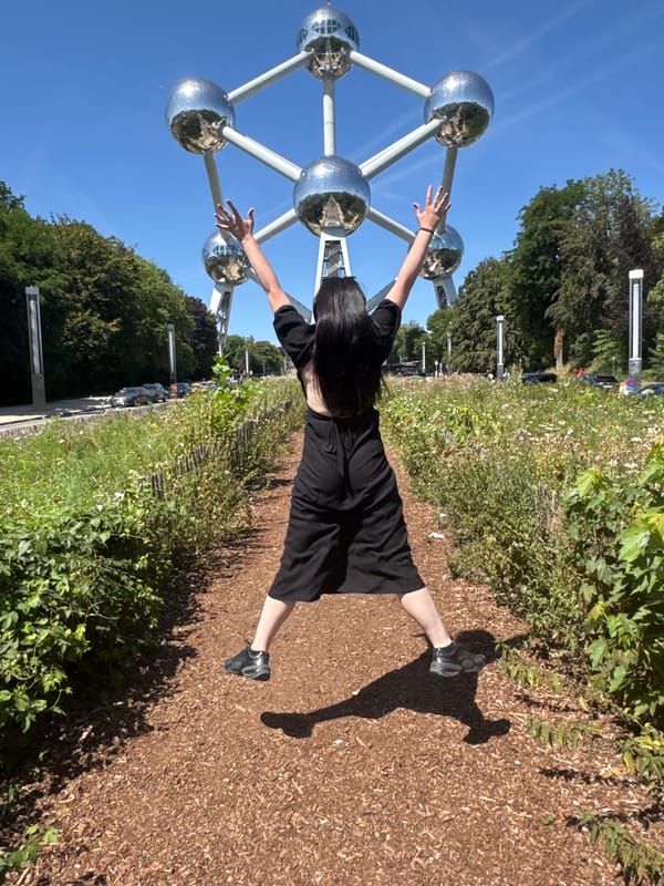 Sunny afternoon at Brussels' Atomium and surrounding sculptures.