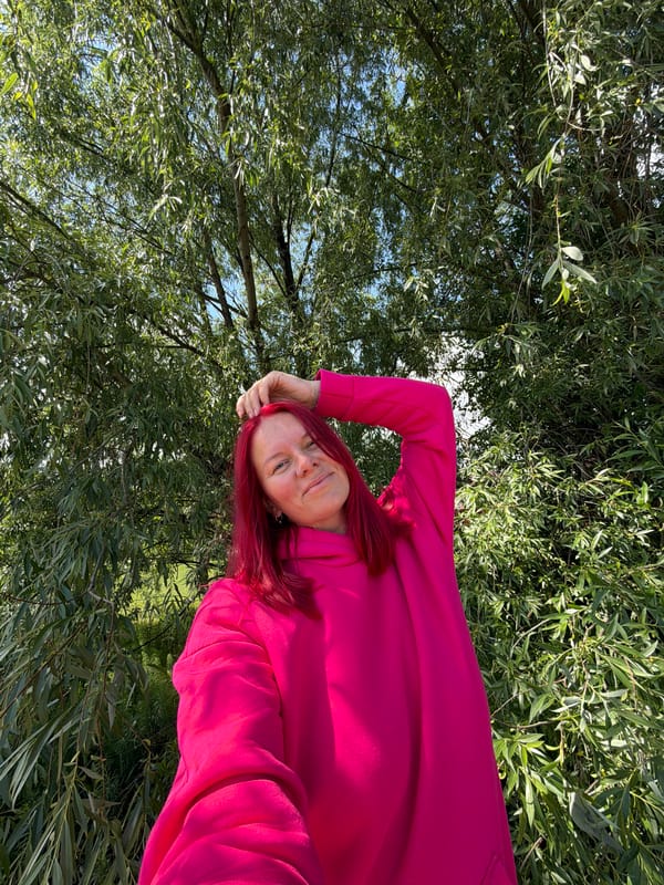 Pink-haired person photographed during morning outing in rural Russia