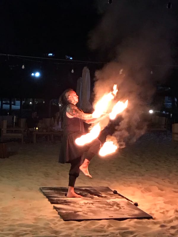 Fire performers take the beach at a Vietnam beachfront bar night