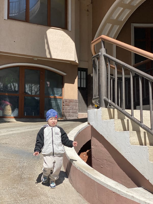 Child's morning routine captured across Sochi neighborhoods