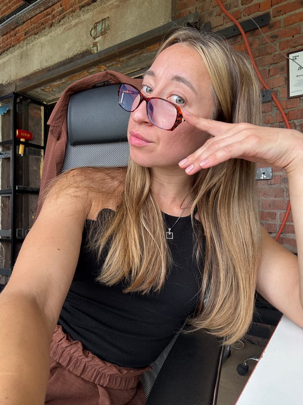 Quick selfie session in a brick-walled office space, Chaikovsky