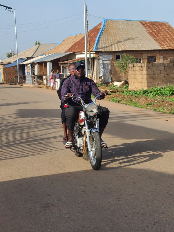 Morning motorcycle and pedestrian activity observed in urban area
